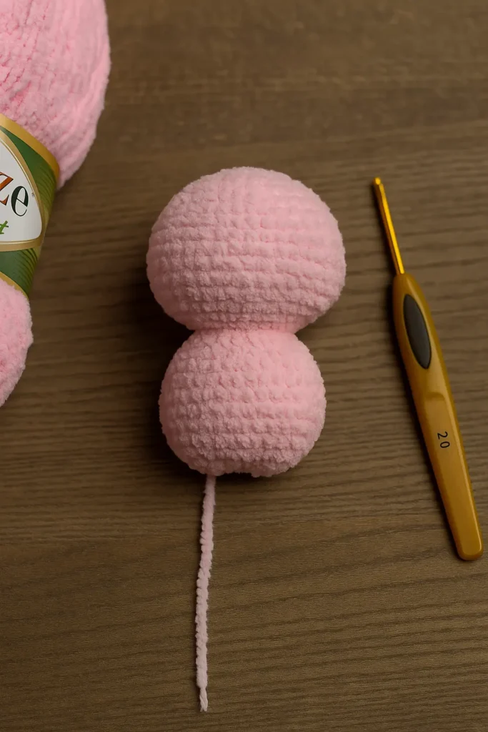 Soft pink Labubu crochet body using Alize Softy yarn