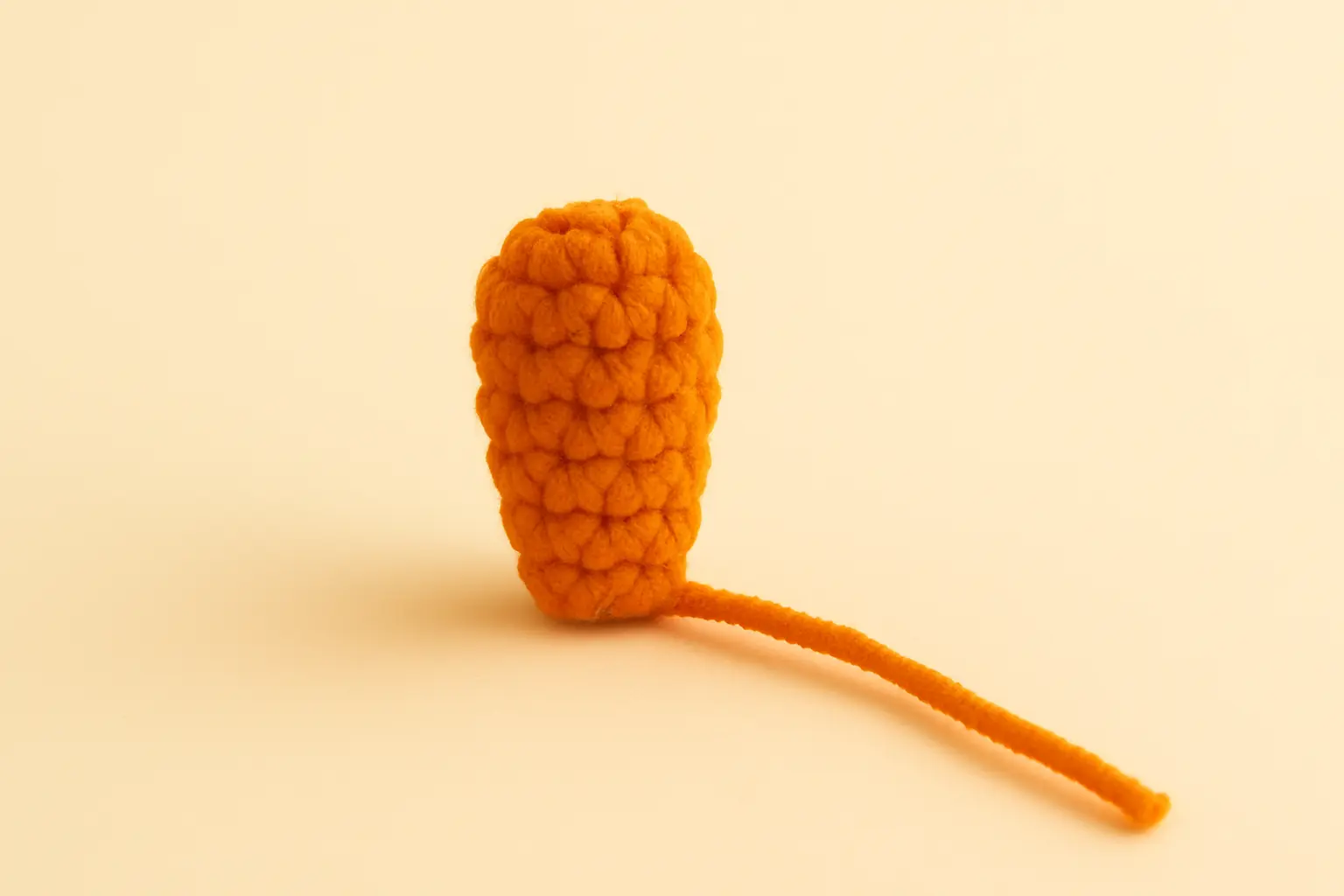 long curled crochet cat tail for loaf cat amigurumi pattern
