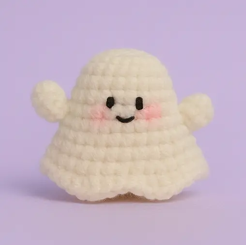 Wide-skirt crochet ghost with stick arms and wavy hem — free pattern