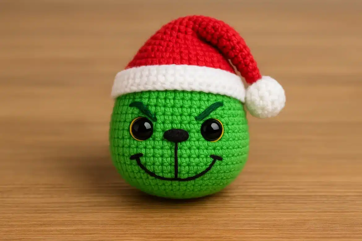 free Grinch crochet pattern close-up of Grinch head with Santa hat