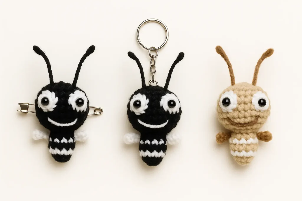 Crochet Ant Easy Amigurumi Keychain with brooch and beige variation, asymmetric eyes, tiny wings, and antennae