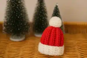 crochet mini santa hat pattern with bottle brush trees