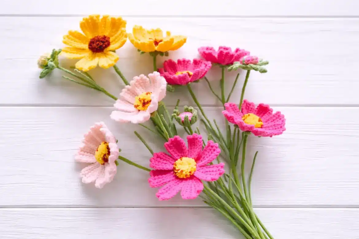 Crochet cosmos flower bouquet pattern finished bouquet arrangement with pink and yellow flowers